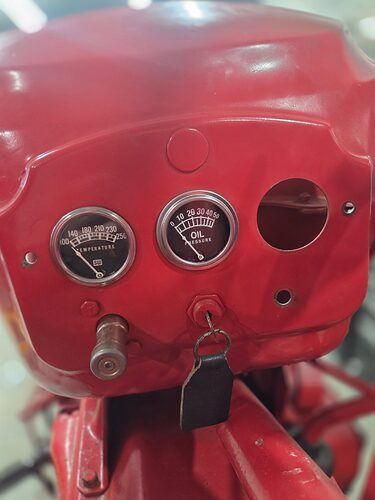 Massey Harris 30 dash with an empty round gauge opening