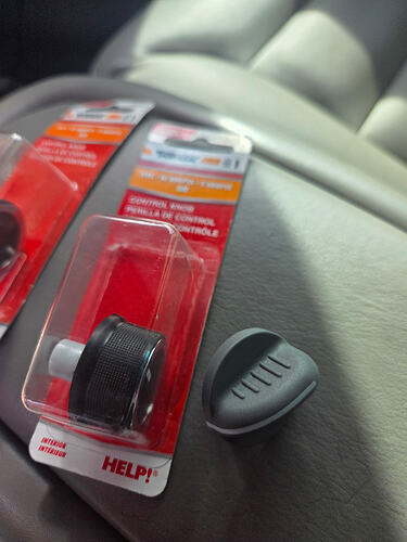 Dorman 76834 HVAC knob next to factory OBS Chevy knob comparison