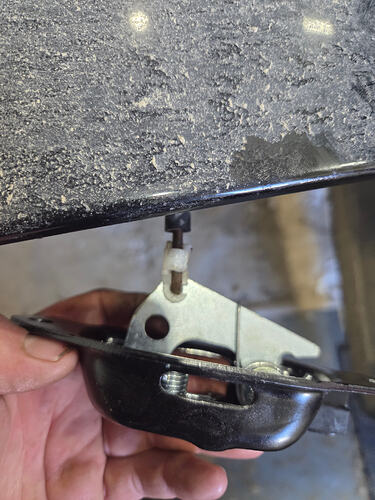 The rods have to be pried out of the tailgate latches.