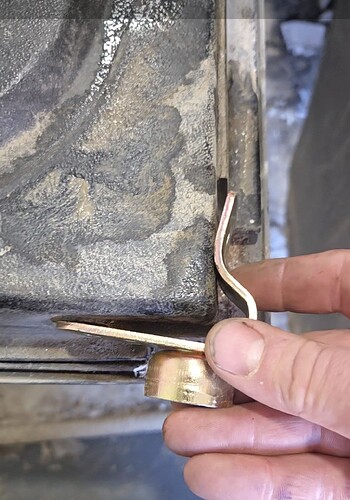 Dorman tailgate side hinge does not fit great. You could modify it by bending an redrilling the holes.